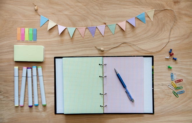 Image of a multi-coloured wedding planner book.