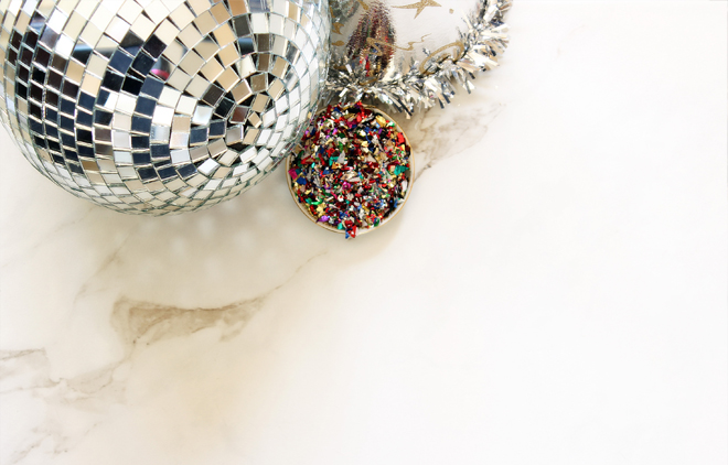 Image of a silver disco ball.