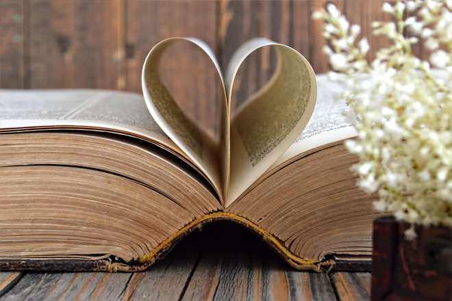 Image of a book with pages shaped like a heart.