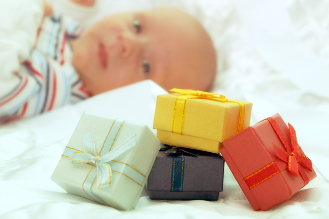 Image of gift boxes and a baby.