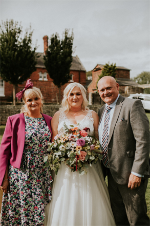 Image of Steve Pritchard-Jones and brides and bridesmaids. 